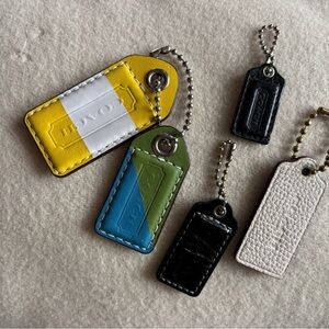 5 coach leather purse tags